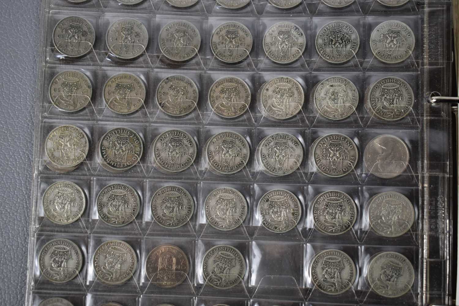 A collection of GB and worldwide coins, some silver to include florins and shillings and some - Image 2 of 2