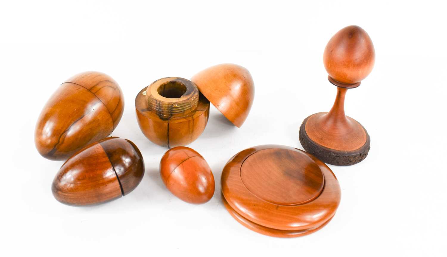 A group of treen sewing aids, to include a 19th century olive wood darning egg form etui, a childs - Image 2 of 14
