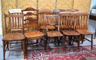 A harlequin set of five elm kitchen chairs, an oak jadiniere stand and a 19th century elm ladderback