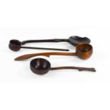 A group of 19th century treen to include a Scotch Kale skimming spoon, an 18th century ladle, a