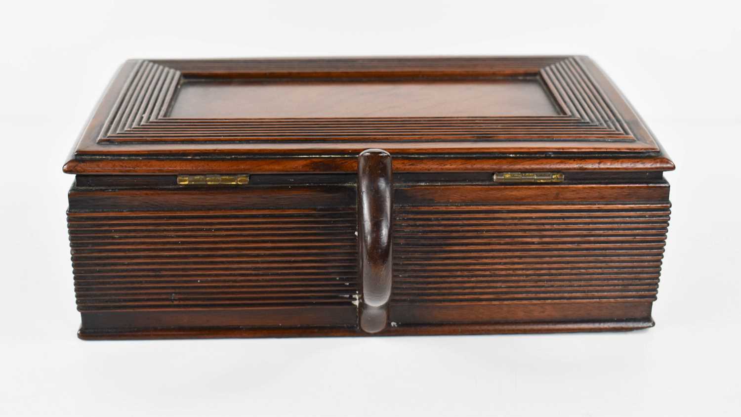 A Georgian mahogany cigar box, with a shaped handle to the back, lid and sides having reeded - Image 3 of 5