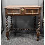 A 17th century oak side table with single drawer, barley twist legs and H form stretcher, top