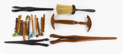 A selection of 19th century treen, to include a fruitwood hat gauge, three pairs of glove