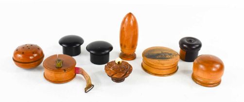 A selection of 19th century treen to include a coquilla nut carved vinaigrette, four snuff boxes