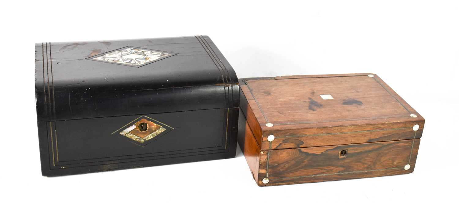 Two 19th century boxes, one in mahogany with mother of pearl inlay, containing sewing accessories,