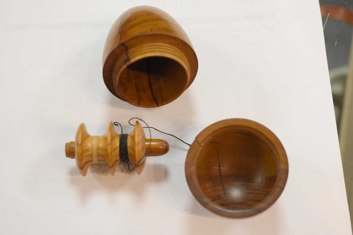 A group of treen sewing aids, to include a 19th century olive wood darning egg form etui, a childs - Image 7 of 14