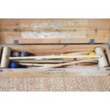 A vintage Jaques of London croquet set, in the original wooden case. [Provenance: The Estate of