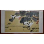 A mid 20th century Japanese painting on silk of cranes over water, bearing signature to the left