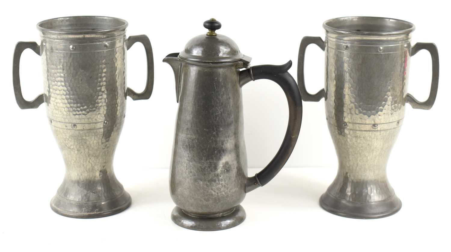 A Liberty & Co "Tudric" pewter coffee pot designed by Archibald Knox together with a pair of Twin