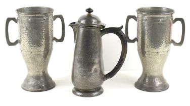 A Liberty & Co "Tudric" pewter coffee pot designed by Archibald Knox together with a pair of Twin