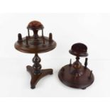 Two Victorian work / bobbin stands, one rosewood example, with rotating bobbin holder centred by the