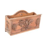 A Scottish Arts and Crafts oak wall hanging newspaper / magazine rack, the front and sides carved