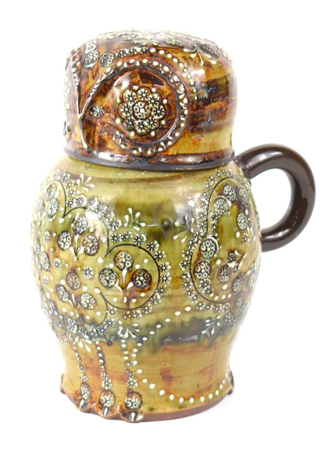 A Leonard Stockley Weymouth pottery slipware jug, modelled in the form of an owl, in green and brown