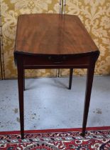 A 19th century mahogany pembroke table with two drop leaves and single drawer, raised on square