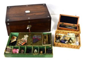 A 19th century rosewood sewing box, with mother of pearl stringing and inlay, opening to reveal
