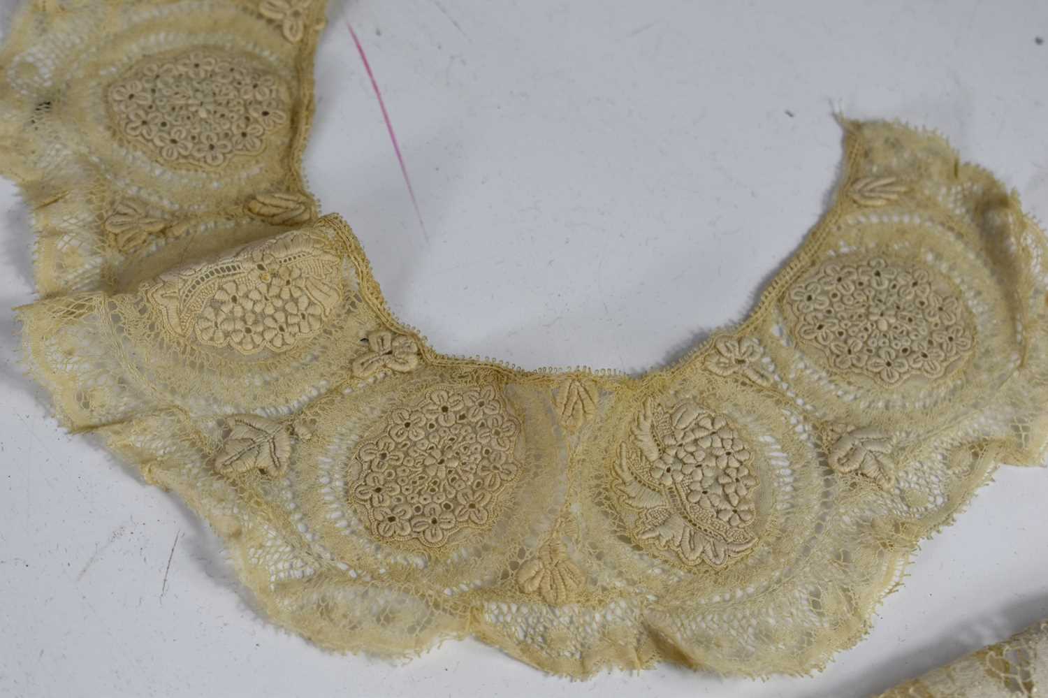 A collection of antique lace and embroidered net to include dress pieces, handkerchiefs, collars, - Image 4 of 11