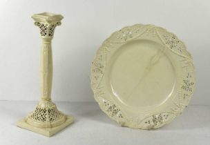 A Leeds creamware candlestick and plate, late 18th century, with pierced decoration, the candlestick