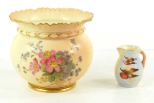 A Royal Worcester blush ivory vase decorated with daisies, 10cm, together with a small Locke & Co