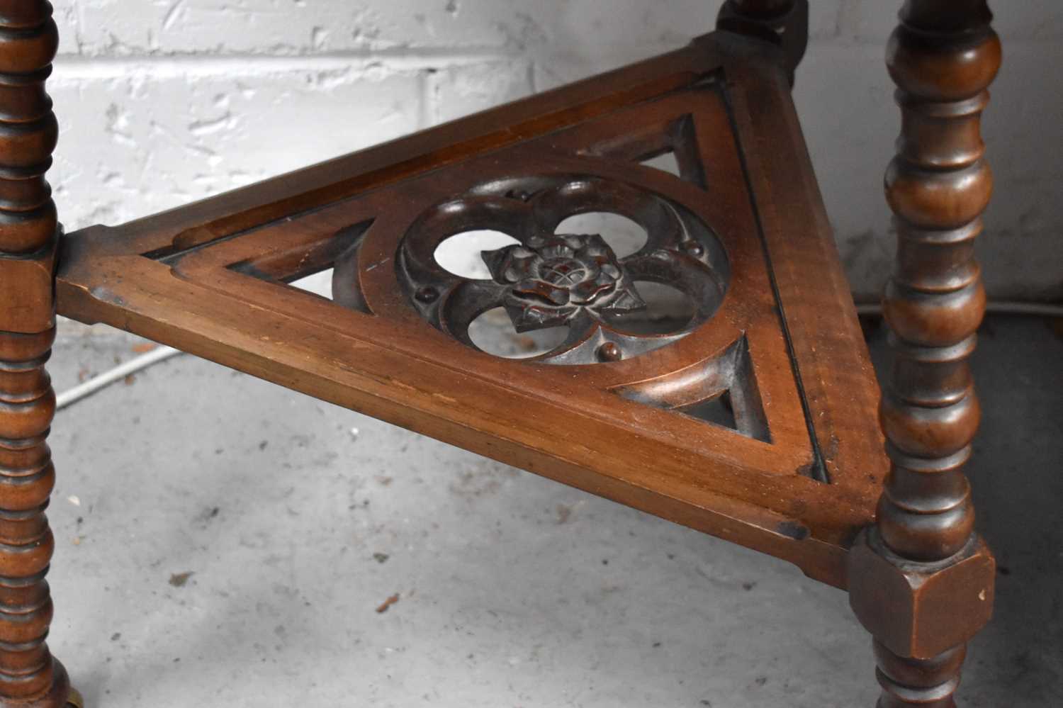 A Hexagonal mahogany Arts & Crafts side table, with cope castors, and three legs. - Image 2 of 3