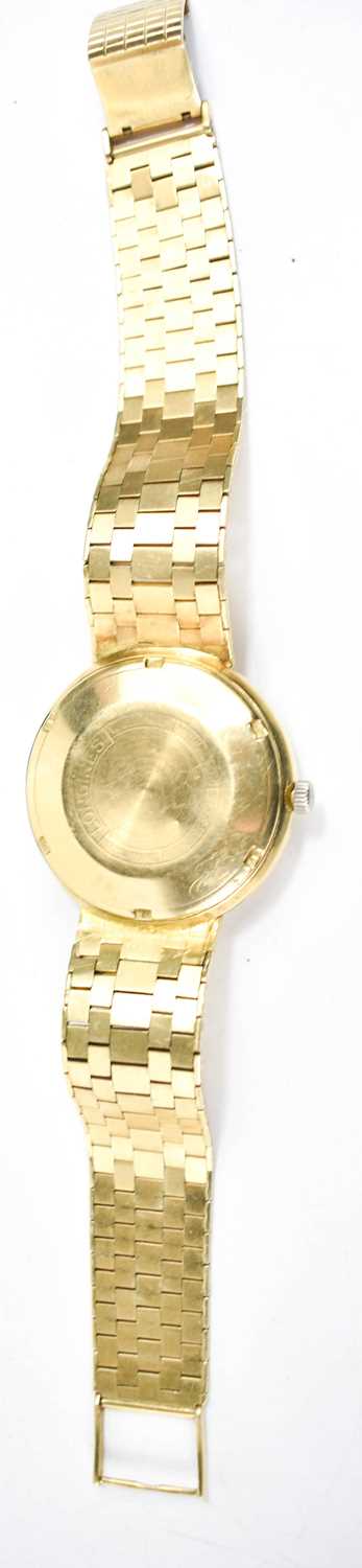 An 18ct gold Longines wristwatch, the dial having a calendar aperture and baton markers, with an - Image 2 of 3