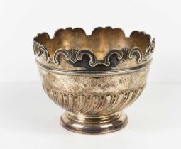 A silver pedestal bowl, with shaped rim, gadrooned body, London 1895, 12cms, 13.13toz.