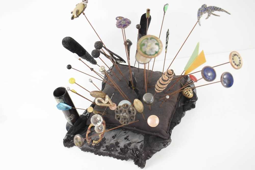 A Victorian pin cushion with thirty eight vintage hat pins of various design, including Art Deco - Image 2 of 3