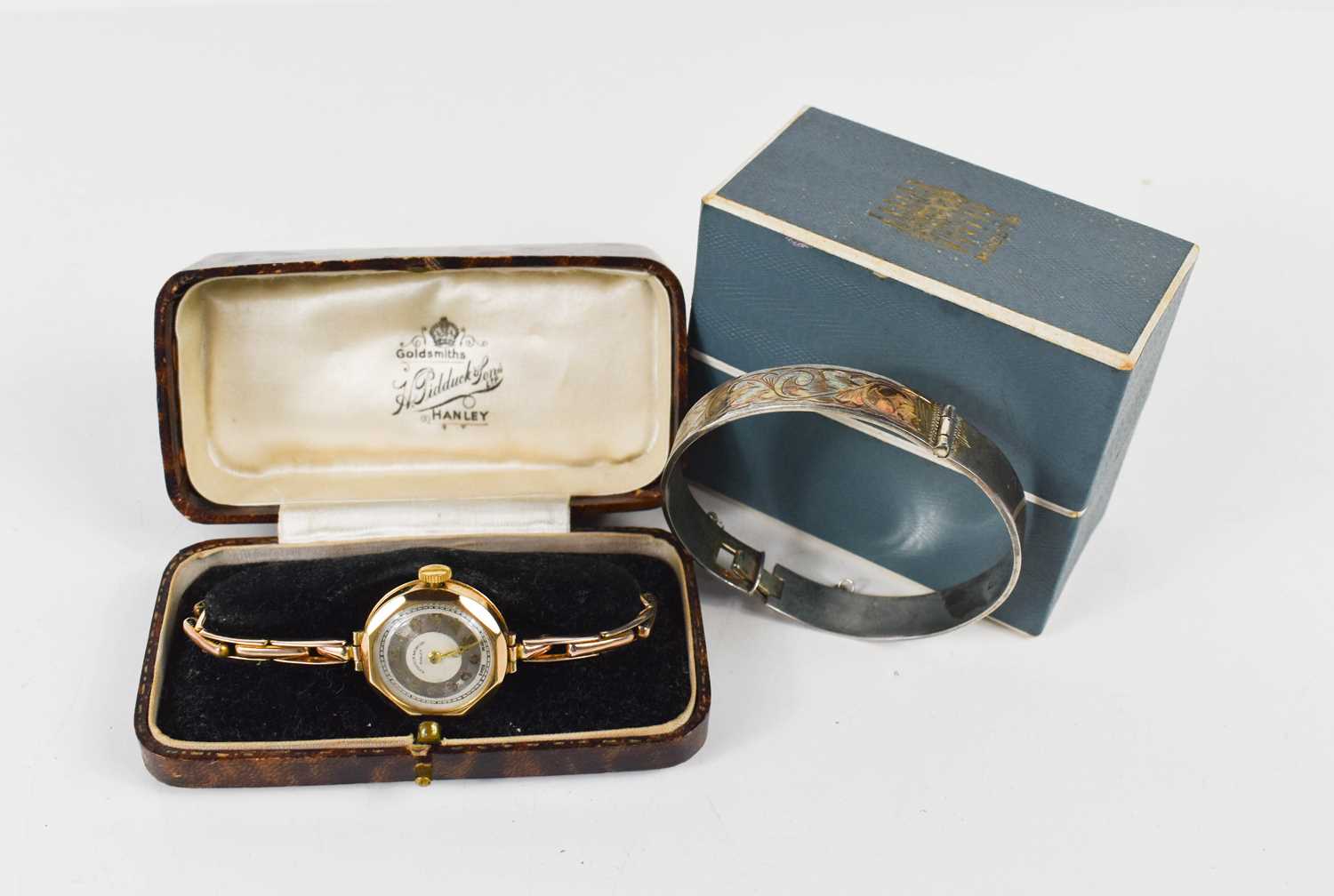 A H Pidduck & Sons of Hanley 9ct gold wristwatch with 9ct gold stretch link strap, 14.95g,