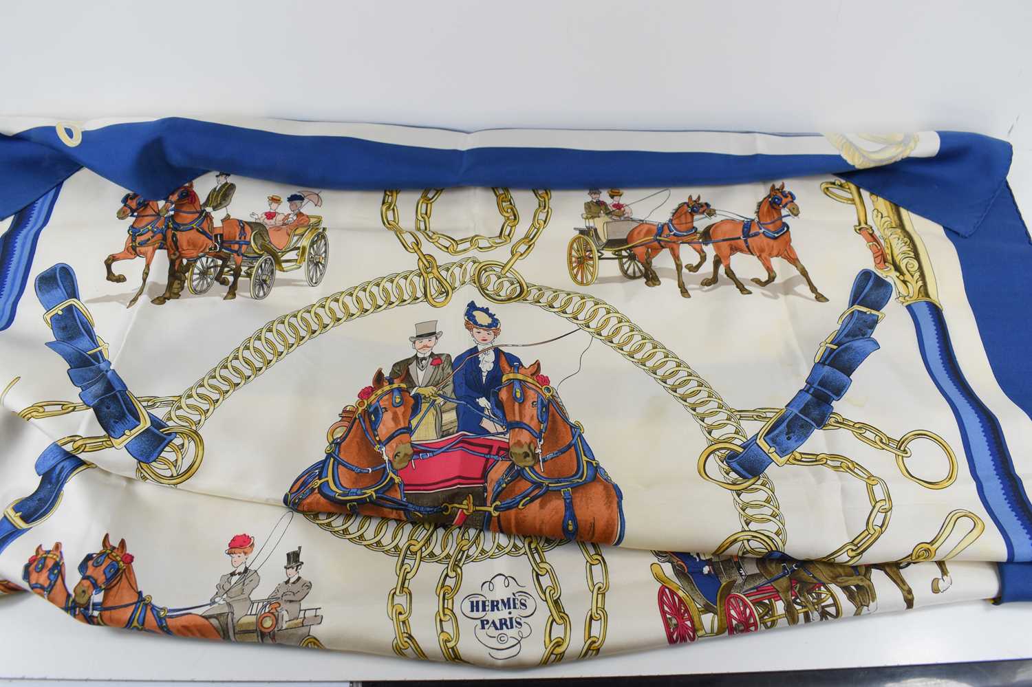 A vintage late 20th century Hermes silk scarf, Equipage Ledoux, depicting carriage driving, with