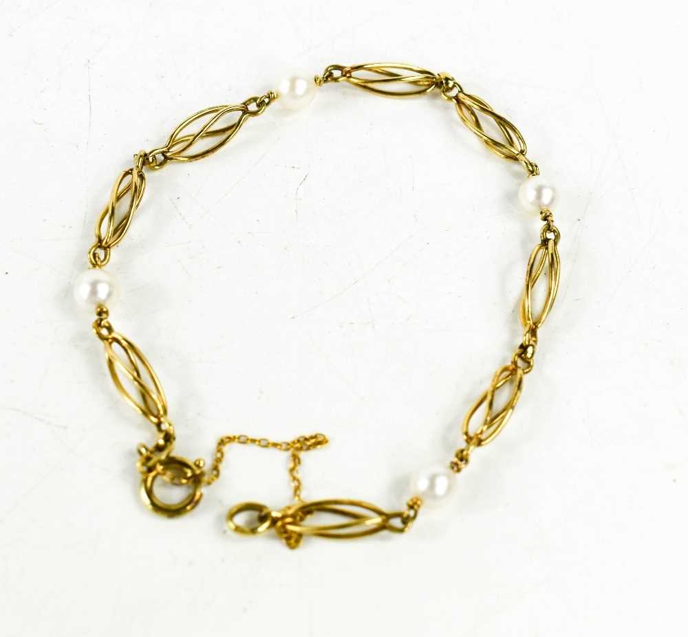 A 9ct gold and pearl bracelet, composed of spiral links interspersed with pearls, with hoop clasp - Image 2 of 2