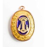 A 9ct gold & enamel oval Masonic pendant, engraved verso 'Presented to Wor Bro A Winterbotham