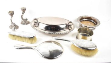 A silver backed dressing table set comprising brush, mirror and clothes brush, together with two