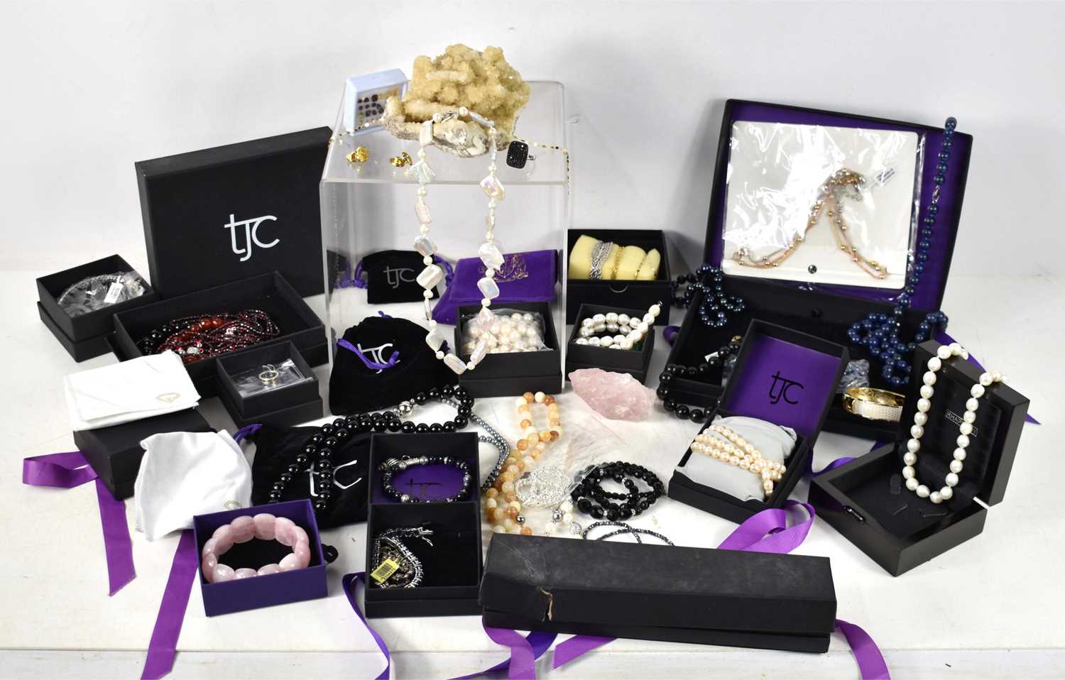 A group of TJC, Rocks & Co and similar jewellery including a Rocks & Co grey pearl four stranded