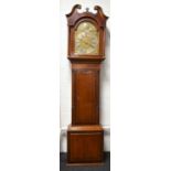 A 19th century oak and mahogany cased longcase clock, the chapter ring bordering subsidiary calendar