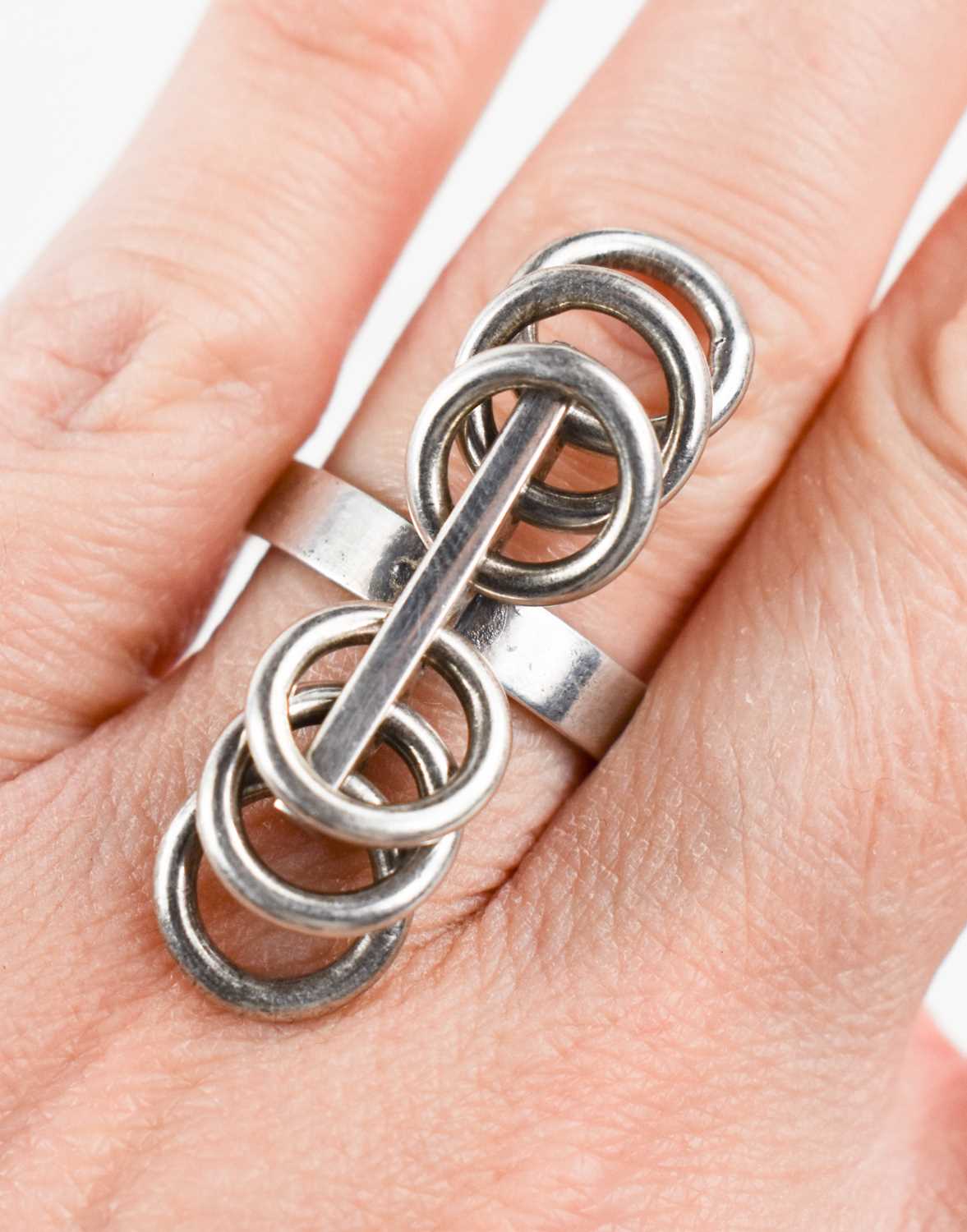 Hans Hansen of Denmark silver ring, composed of multiple hoops that move freely, stamped HaH, size