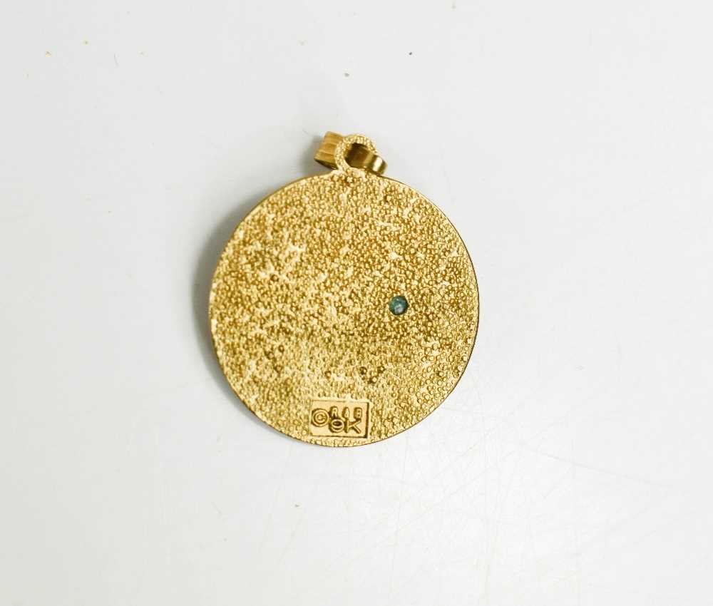 A 9ct gold astrological pendant, set with a green cabochon, 22.5mm diameter, 3.1g. - Image 2 of 2