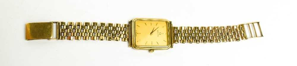 A gentleman's 9ct gold cased Omega dress watch, the signed champagne dial with baton numerals, - Image 2 of 3