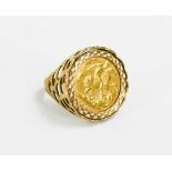 An Edward VII half sovereign, 1902 in 9ct gold ring mount, size K/L, total weight 7.6g.