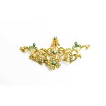 A 15ct gold, turquoise and seed pearl pendant of scrolling flower and foliate form, 6.3 by 3.7mm