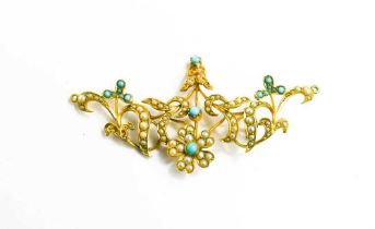 A 15ct gold, turquoise and seed pearl pendant of scrolling flower and foliate form, 6.3 by 3.7mm