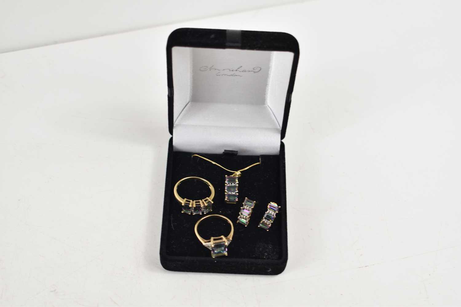 A suite of jewellery set in 9ct gold with diamond brilliants and iridescent green and pink stone, - Image 2 of 4