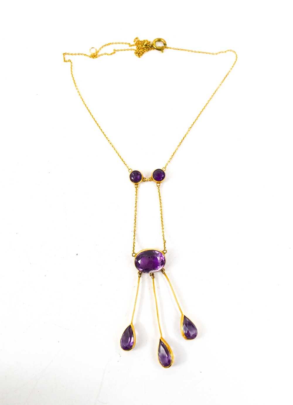 An Art Nouveau, Edwardian, 9ct gold and amethyst necklace, set with three suspended pear cut - Image 2 of 2