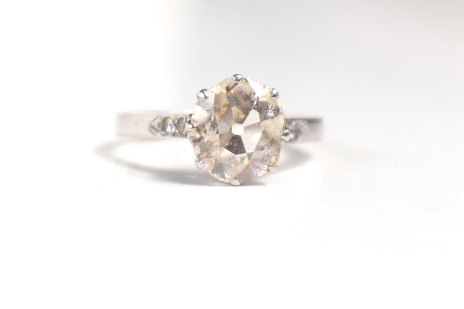An old brilliant cut solitaire diamond and platinum ring, the diamond of very slightly uneven - Image 5 of 7