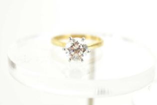 An 18ct gold, platinum and diamond solitaire ring, the diamond of approximately 1.5ct, 7.3mm