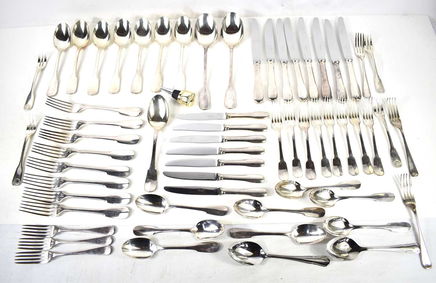 A set of Christofle plated flatwares comprising eight knives, butter knives, forks, dessert forks,