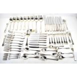 A set of Christofle plated flatwares comprising eight knives, butter knives, forks, dessert forks,