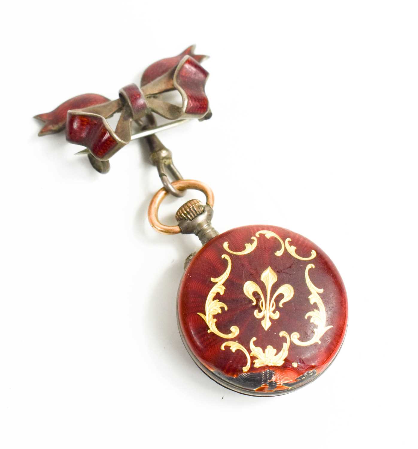 A silver and red enamel ladies pocket watch, with bow form red enamel brooch, gilded fleur-de-lys - Image 2 of 2