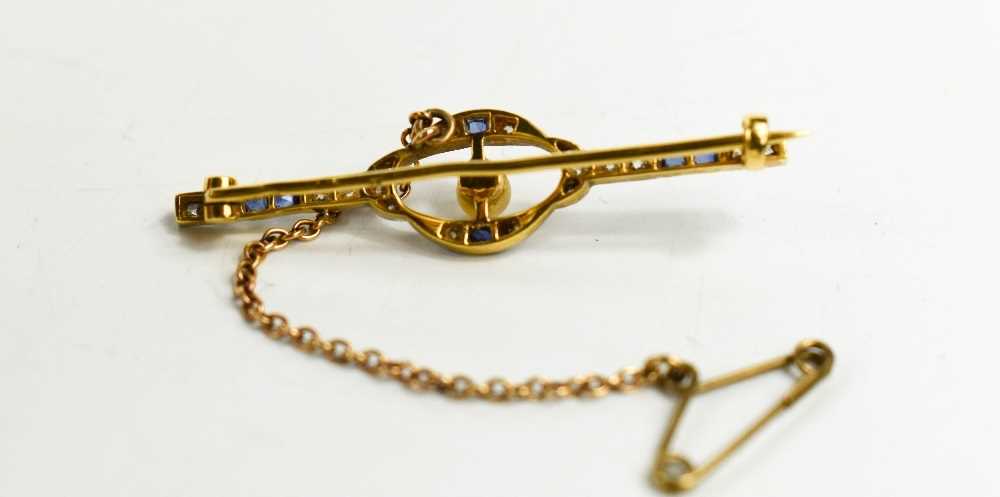 An Art Deco 18ct gold, diamond and sapphire brooch, with a central pearl, safety chain and gold pin, - Image 2 of 2