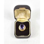 A 9ct gold and amethyst dress ring, of modernist design with textured detail, size G, 6.5g.