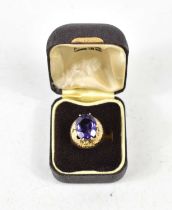 A 9ct gold and amethyst dress ring, of modernist design with textured detail, size G, 6.5g.