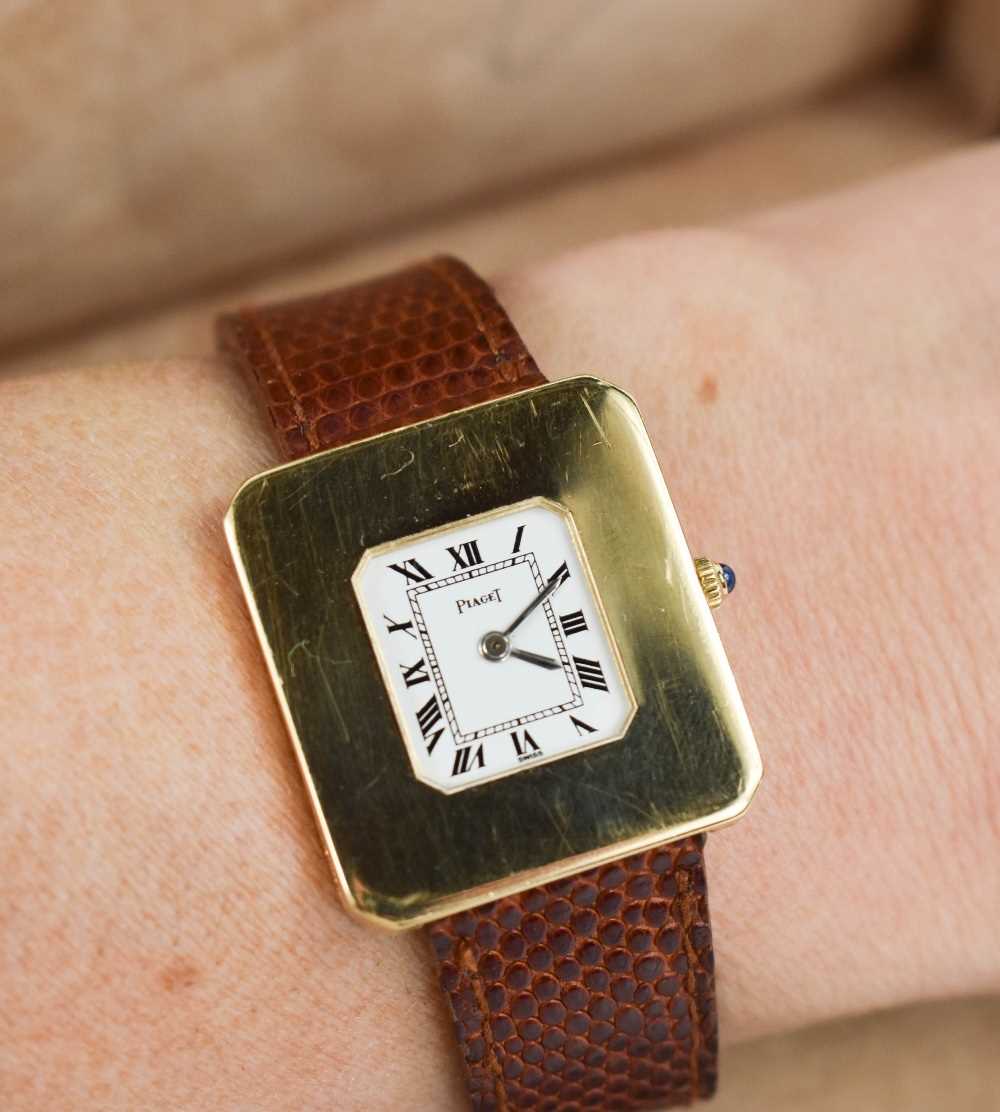 A lady's Piaget wristwatch, the signed white dial with roman numerals and minute track, in wide